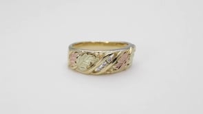 Black Hills Gold 3-Stone Diamond Accent Wedding Ring in 10K Yellow Gold close-up detail