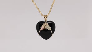 Black Hills Gold Heart Onyx Grape Cluster & Leaf Pendant in 10K Yellow Gold close-up detail