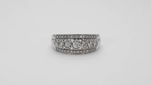 1/2 ct. tw. Round Diamond Anniversary Ring with Center Twist Accent in 10K White Gold front view
