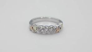 Black Hills Gold Round 3-Stone Cubic Zirconia Four Leaf Anniversary Ring in Sterling Silver close-up detail