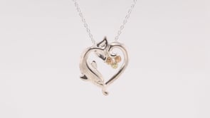 Black Hills Gold Leaf Dolphin Heart Pendant in Sterling Silver close-up detail
