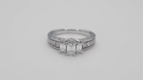 Timeless Collection 1-1/2ct. tw. Emerald Cut Diamond 3-Stone Engagement Ring with Prong-Set Diamond Sides in close-up detail