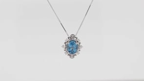 Impulse Collection Genuine Oval London Blue Topaz Fashion Pendant with 1/8 ct. tw. Diamond Filigree & Milgrain front view
