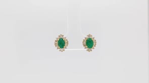 Emerald and Diamond 1/4 ct. tw. Round and Baguette Halo Earrings in 10K Yellow Gold close-up detail