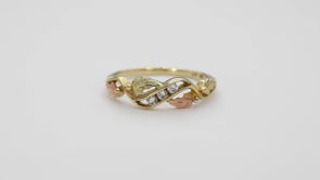 Black Hills Gold 1/10 ct. tw. Round 3-Stone Diamond Channel Set Anniversary Ring in 10K Yellow Gold close-up detail
