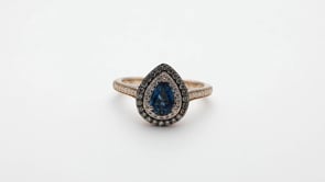 Le Vian Chocolatier Pear Deep Sea Blue Topaz & 3/8 ct. tw. Chocolate & Vanilla Diamond Double Halo Ring in close-up detail