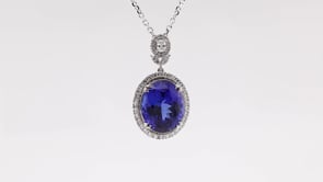 Oval Tanzanite & 1/2 ct. tw. Diamond Halo Pendant in 18K White Gold front view
