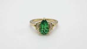 Pear Tsavorite & Diamond Accent Ring in 18K Yellow Gold close-up detail