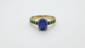 Oval Sapphire, Tsavorite Garnet & 1/8 ct. tw. Diamond Ring in 18K Yellow Gold close-up detail