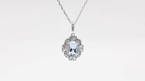 Cushion Aquamarine & 1/4 ct. tw. Round & Baguette Diamond Halo Pendant in 10K White Gold front view