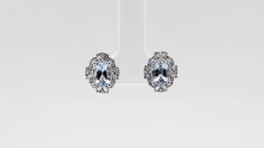 Cushion Aquamarine & 3/8 ct. tw. Round & Baguette Diamond Halo Earrings in 10K White Gold close-up detail
