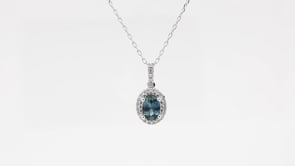 American Colors Oval Montana Sapphire and 1/7 ct. tw. Diamond Halo Pendant in 10K White Gold front view