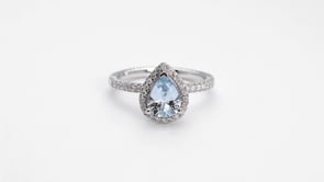 Pear Aquamarine and 1/5 ct. tw. Diamond Halo Ring in 10K White Gold close-up detail