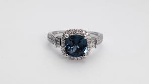 Cushion London Blue Topaz and 1/2 ct. tw. Diamond Halo Ring in 14K White Gold close-up detail
