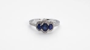 3-Stone Oval Sapphire & 1/3 ct. tw. Diamond Halo Ring in 14K White Gold close-up detail