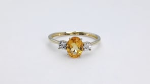 Oval Citrine and Diamond Accent Fashion Ring in 10K Yellow Gold close-up detail