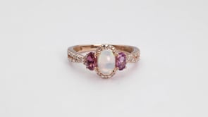 3-Stone Oval Opal, Pink Rhodolite Garnet & Diamond Accent Ring in 10K Pink Gold close-up detail