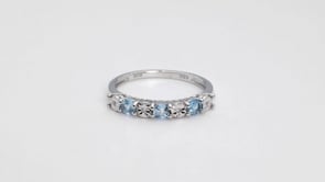 Round Blue Topaz and Diamond Accent Fashion Band in 10K White Gold close-up detail