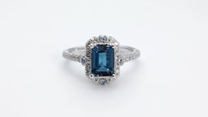 Emerald Cut Blue Topaz and 1/3 ct. tw. Diamond Ring in 14K White Gold close-up detail