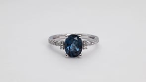 Oval London Blue Topaz and 1/5 ct. tw. Diamond Ring in 10K White Gold side profile