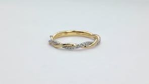Perfect Match 1/10 ct. tw. Diamond Twist Stackable Anniversary Ring in 10K Yellow Gold close-up detail