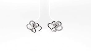 Infinite Love Diamond Accent Triple Heart Earrings in Sterling Silver front view