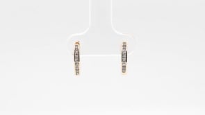 1/8 ct. tw. Diamond Channel Set Hoop Earrings in 10K Yellow Gold front view
