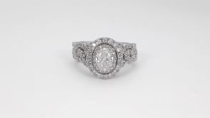 Amaura Collection 2-1/4 ct. tw. Oval Diamond Halo Wedding Set with Twist Band in 14K White Gold angled view
