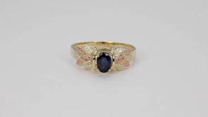 Black Hills Gold Oval Sapphire & Leaf Cluster Ring in 10K Yellow Gold close-up detail