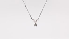 1/10 ct. tw. A Quality Round Brilliant Diamond Solitaire Pendant in 14K White Gold front view