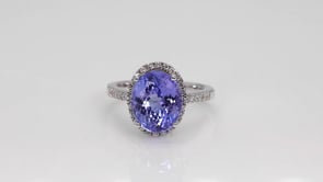 Oval Tanzanite & 1/3 ct. tw. Diamond Halo Ring in 14K White Gold side profile