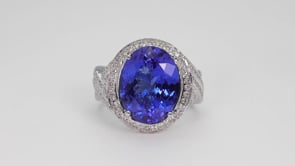 Oval Tanzanite & 1 ct. tw. Diamond Halo Twist Ring in 14K White Gold side profile