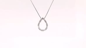 1/4 ct. tw. Round & Baguette Diamond Pear-Shaped Pendant in 10K White Gold side profile