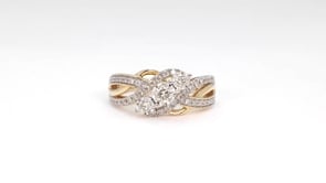 1/2 ct. tw. Diamond 3-Stone Bypass Ring with Miracle Plates in 10K Yellow Gold close-up detail