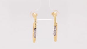 1/4 ct. tw. Diamond Ribbed Hoop Earrings in 10K Yellow Gold close-up detail