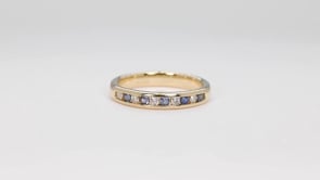 Yogo Sapphire & 1/5 ct. tw. Diamond Channel Set Ring in 10K Yellow Gold close-up detail