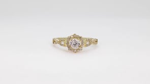 Infinite Love 1/3 ct. tw. Diamond Starburst Halo Promise Ring with Twist Shank & Miracle Plate in 10K Yellow close-up detail