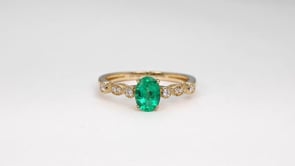 Oval Emerald & 1/10 ct. tw. Diamond Milgrain Ring in 14K Yellow Gold close-up detail