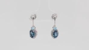 Oval London & Swiss Blue Topaz & Diamond Accent Halo Drop Earrings in 10K White Gold front view
