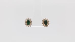 Oval Emerald & 1/5 ct. tw. Diamond Halo Earrings in 14K Yellow Gold front view