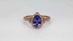 Pear Tanzanite & 1/2 ct. tw. Diamond Halo Ring in 14K Pink Gold close-up detail