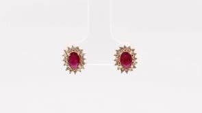 Oval Ruby & 1/4 ct. tw. Diamond Halo Earrings in 14K Yellow Gold front view
