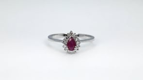 Pear Ruby & 1/7 ct. tw. Diamond Halo Ring in 14K White Gold close-up detail