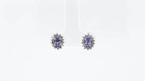 Oval Tanzanite & 1/5 ct. tw. Diamond Halo Earrings in 14K White Gold front view