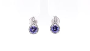 Round Tanzanite & 1/5 ct. tw. Diamond Halo Twist Earrings in 14K White Gold front view