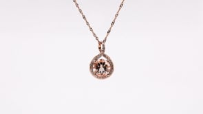 Round Morganite & 1/10 ct. tw. Diamond Halo Twist Pendant in 14K Pink Gold front view