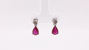 Pear Ruby & 1/8 ct. tw. Diamond Drop Earrings in 14K White Gold front view