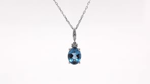 Oval London Blue Topaz & Diamond Accent Drop Pendant in 10K White Gold front view