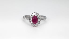 Oval Ruby & 1/2 ct. tw. Diamond Halo Ring in 10K White Gold front view