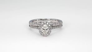 Natural 1 ct. tw. Oval Diamond Halo Wedding Set in 14K White Gold full view